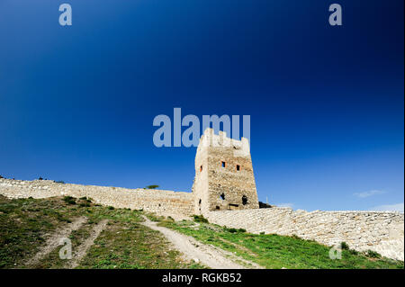 Genoese castle Caffa from XIV century in Feodosia, Crimea, Ukraine. October 4th 2008. City founded as Theodosia by Greek colonists from Miletos in the Stock Photo