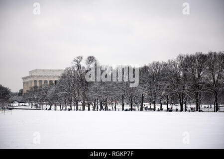 WASHINGTON, DC - A blanket of freshly fallen snow on the JFK Hockey Fields near the Lincoln Memorial in Washington DC. The large building in the background is part of the Lincoln Memorial. Stock Photo