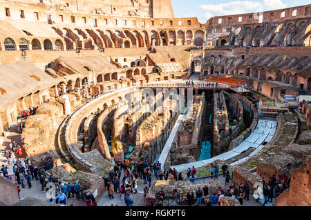 Rome, Italy - November 17, 2018: Tourist watching the famous Colosseum or Coliseum, also known as the Flavian Amphitheatre, is an oval amphitheatre in Stock Photo