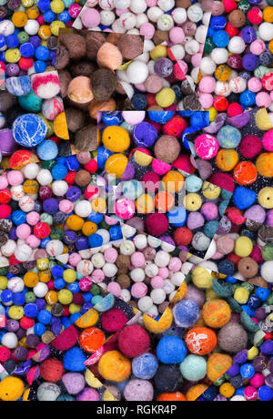 Abstract background from multi-colored balls of wool Stock Photo