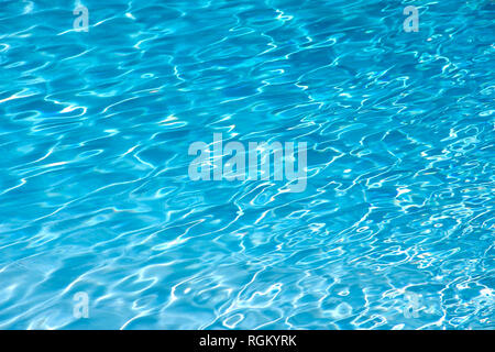 The blue water in the pool with the reflexions Stock Photo
