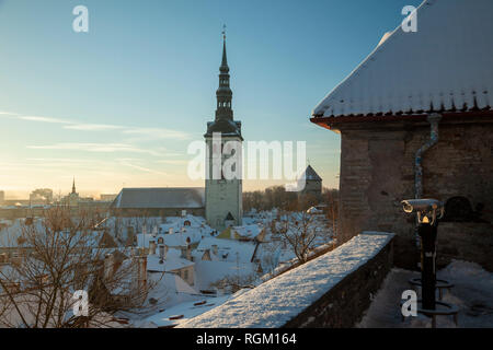 Winter morning in Tallinn old town, Estonia. St Nicholas church tower over the city. Stock Photo