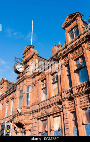 Boarded up majestic red brick large Victorian building in West Bromwich High Street Stock Photo