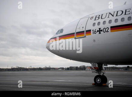 27 January 2019, Germany (German), Berlin: The government plane 'Theodor Heuss' is standing on the runway in Tegel before departure to Ethiopia. Due to a defect in the government aircraft 'Theodor Heuss', Federal President Frank-Walter Steinmeier cannot fly back from Ethiopia to Berlin as planned. In Addis Ababa, the technical problem of the A 340 was being worked on at high pressure. Photo: Britta Pedersen/dpa-Zentralbild/dpa Stock Photo