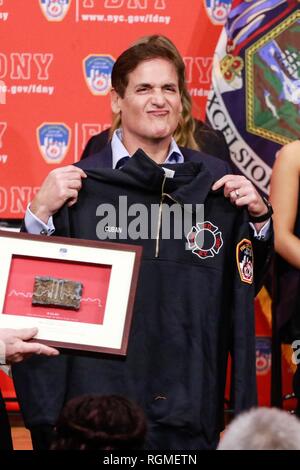 Brooklyn, NY, USA. 30th Jan, 2019. Mark Cuban pictured as Shark Tank investors and Cup Board Pro entrepreneurs, Kaley, Christian and Keira Young, present a donation for the FDNY Foundation, in honor of their father, Keith Young an FDNY firefighter who died last year of a 9/11-related illness. January 30, 2019 at FDNY Headquarters in Brooklyn, New York City. Credit: Diego Corredor/Media Punch/Alamy Live News Credit: MediaPunch Inc/Alamy Live News Stock Photo