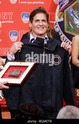 Brooklyn, NY, USA. 30th Jan, 2019. Mark Cuban pictured as Shark Tank investors and Cup Board Pro entrepreneurs, Kaley, Christian and Keira Young, present a donation for the FDNY Foundation, in honor of their father, Keith Young an FDNY firefighter who died last year of a 9/11-related illness. January 30, 2019 at FDNY Headquarters in Brooklyn, New York City. Credit: Diego Corredor/Media Punch/Alamy Live News Credit: MediaPunch Inc/Alamy Live News Stock Photo