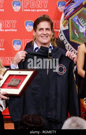 Brooklyn, NY, USA. 30th Jan, 2019. Mark Cuban pictured as Shark Tank investors and Cup Board Pro entrepreneurs, Kaley, Christian and Keira Young, present a donation for the FDNY Foundation, in honor of their father, Keith Young an FDNY firefighter who died last year of a 9/11-related illness. January 30, 2019 at FDNY Headquarters in Brooklyn, New York City. Credit: Diego Corredor/Media Punch/Alamy Live News Credit: MediaPunch Inc/Alamy Live News Stock Photo