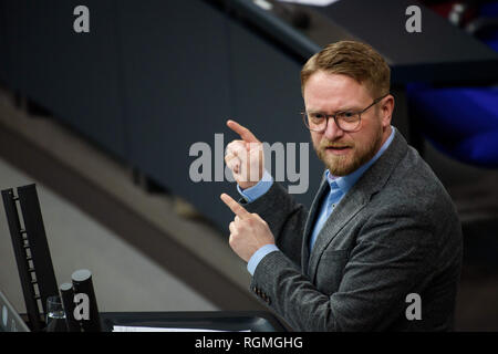 Berlin, Germany. 30th Jan, 2019. Jan Korte (Die Linke), Member of the Bundestag, will speak in the plenary hall of the Reichstag building during a current hour of Parliament. The most important items on the agenda of the meeting are the questioning of the German government by the opposition and a current hour on the current situation in Venezuela. Credit: Gregor Fischer/dpa/Alamy Live News Stock Photo