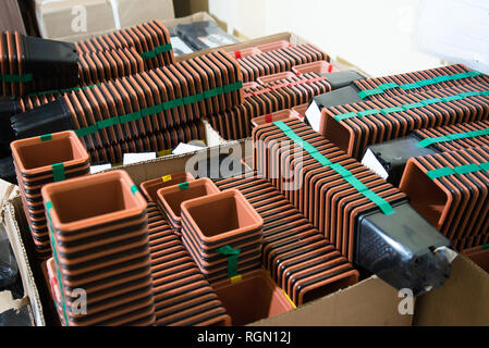 many plastic cups for seedlings, seedling pots in the store Stock Photo