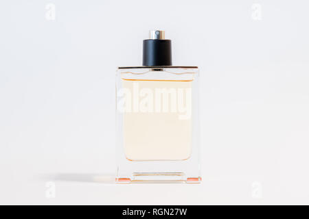 Luxury glass perfume bottle on white background. Copy space for text, blank bottle Stock Photo