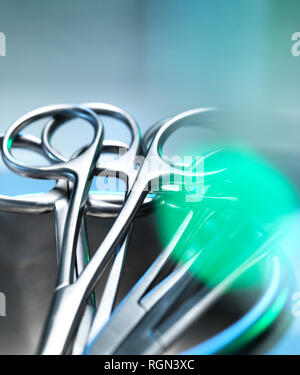 Surgical instruments, surgical scissors in a kidney shaped dish Stock Photo