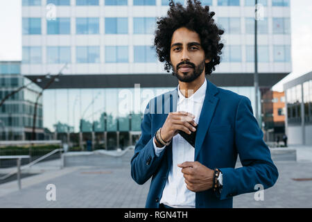 Spain, Barcelona, portrait of stylish young businessman in the city Stock Photo