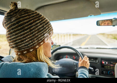 Peru, Arequipa, woman driving car on Panamericana Stock Photo