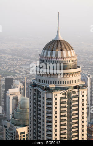 DUBAI, UAE - February 16, 2018: Top of The Princess Tower, a 101 story residential skyscraper in the Dubai Marina area of Dubai, UAE Stock Photo