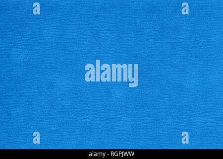 Blue velvet fabric corduroy texture with horizontal sewing patterns Stock Photo