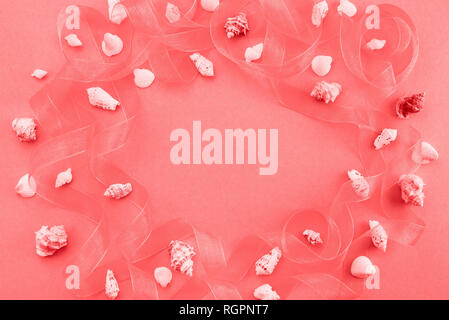 Different sea shells on live coral background. Top view flat lay Stock Photo