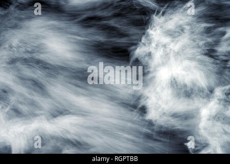 Rough abstract water waves and splashes in fast motion Stock Photo