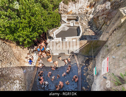 Tourists enjoying the Sulphur Springs, volcanic mud baths, Soufriere, Saint Lucia. Stock Photo