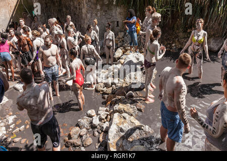 Tourists enjoying the Sulphur Springs, volcanic mud baths, Soufriere, Saint Lucia. Stock Photo