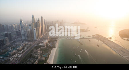 DUBAI, UAE - February 16, 2018: Aerial view of The Palm Jumeirah in Dubai, UAE at dusk Stock Photo