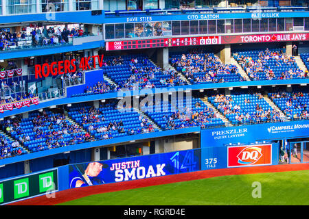 Fans watch the Toronto Blue Jays and Los Angeles Dodgers play in Game 2