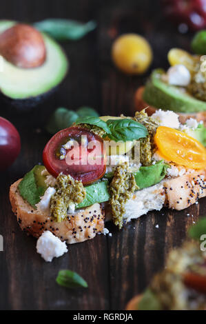 Avocado toast with cherry tomatoes and basil. (Photo by Tammy Ljungblad ...