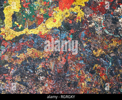 Abstract background formed by colored paint stains randomly spilled on the floor Stock Photo