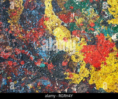 Abstract background formed by colored paint stains randomly spilled on the floor Stock Photo