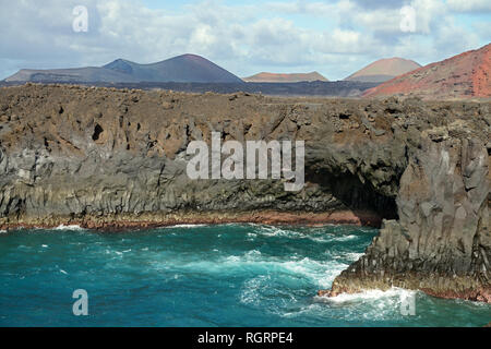 Los Hervideros is a stretch of spectacular volcanic cliffs and underwater caves on the island of Lanzarote located to the north of Playa Blanca Stock Photo