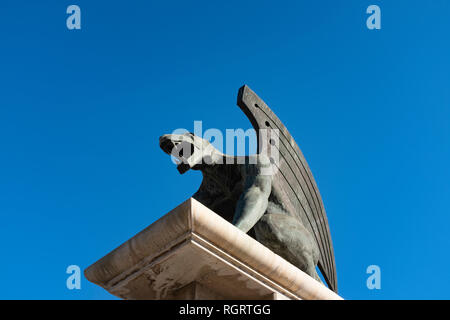 Mythical Creature Griffin Gryphon Statue on top of a plinth Stock Photo