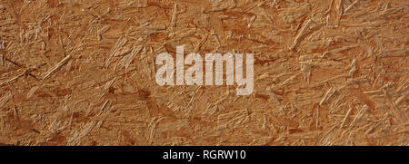Wood, osb, particle board, natural color background, texture. Wooden compressed strand board, banner Stock Photo
