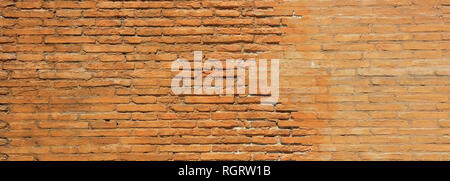 Bricks wall background texture, beige, yellow color, cement, clay. Vintage wall, aged, banner Stock Photo