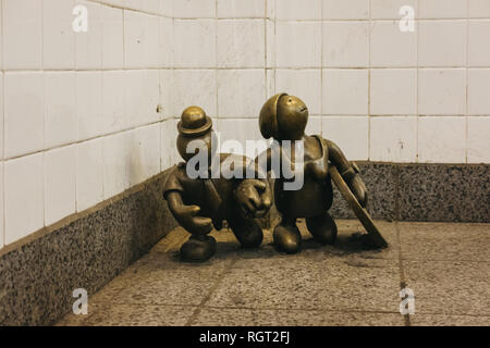 New York, USA - May 30, 2018: Life Underground bronze statues, a permanent public artwork created by American sculptor Tom Otterness for the 14th Stre Stock Photo