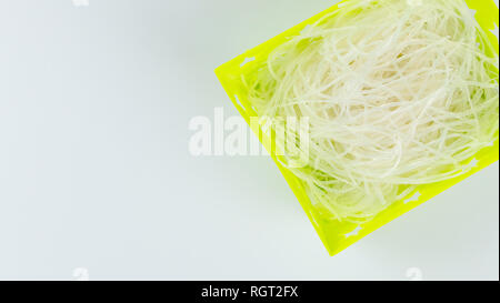 top view vermicelli in basket on white background with copy space Stock Photo