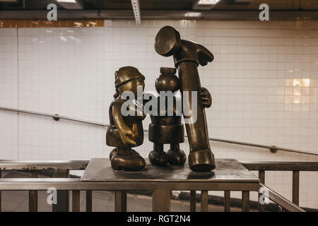 New York, USA - May 30, 2018: Life Underground bronze statues, a permanent public artwork created by American sculptor Tom Otterness for the 14th Stre Stock Photo