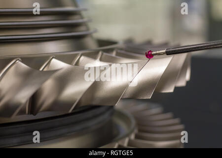 inspect dimension metal parts by CMM after machining process in industrial factory