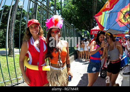 South America, Brazil - February 12, 2017: Costumed revelers having great fun during a pre-Carnival celebration in Rio de Janeiro's South Zone. Stock Photo