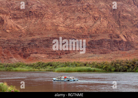 A Western River Expeditions tourist raft on the Colorado River near  Lee's Ferry, Glen Canyon Recreation Area, Arizona, United States. Stock Photo