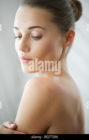 Sexy Fit Naked Woman With Healthy Clean Skin Sitting At Studio. Beautiful  Perfect Female Body Of Pretty Young Caucasian Girl. Stock Photo, Picture  and Royalty Free Image. Image 115550939.