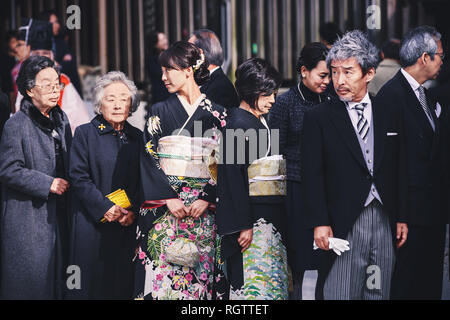 Tokyo, Japan - November 18, 2018: Guests during traditional Japanese wedding ceremony held in the Meiji Jingu (Meiji Shrine). Meiji Shrine is very pop Stock Photo