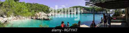 MINORCA-SEPTEMBER 21:unidentified people at beach in Cala Mitjana,Minorca island on september 21,2018. Stock Photo