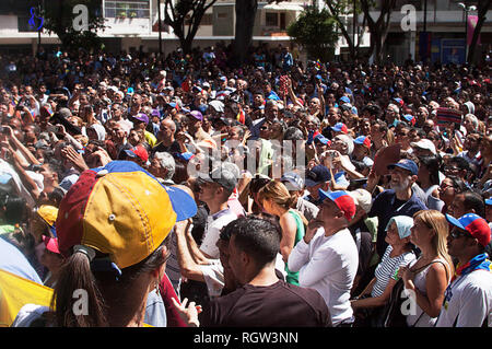 Venezuelan people protesting in Caracas against Maduro and supporting interim president Juan Guaidó Stock Photo