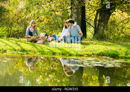 Johannesburg, South Africa - May 09 2015: Young Families at a park picnic Stock Photo