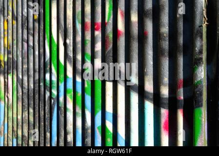 Abstract vertical pattern painted in multi coloured spray paint Stock Photo