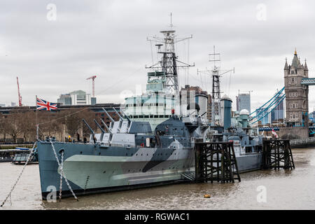 HMS Belfast is a museum ship, originally a light cruiser built for the Royal Navy, currently permanently moored on the River Thames in London, England Stock Photo