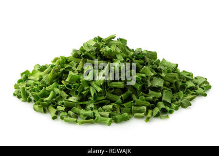 A pile of dried chopped chives isolated on white. Stock Photo