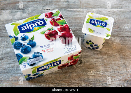 of vegan Soya fruit Yogurt with single yogurt carton distressed wooden Stock Photo - Alamy