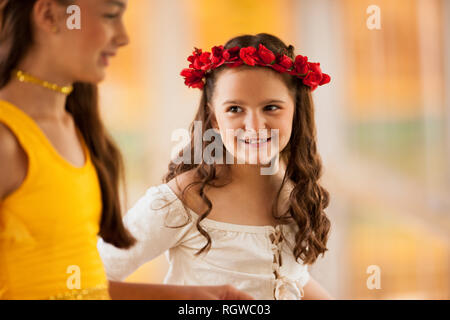 Two smiling girls wearing ballet costumes. Stock Photo