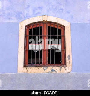 Broken window in Lisbon, Portugal Stock Photo