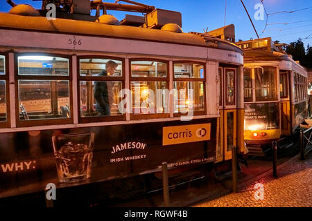 Two trams at night in Lisbon, Portugal, January 2019 Stock Photo